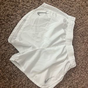 white nike running shorts